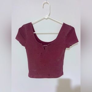 This is a cropped t-shirt.